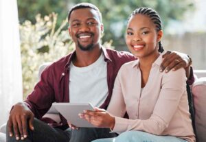 young couple reading funeral planning guide